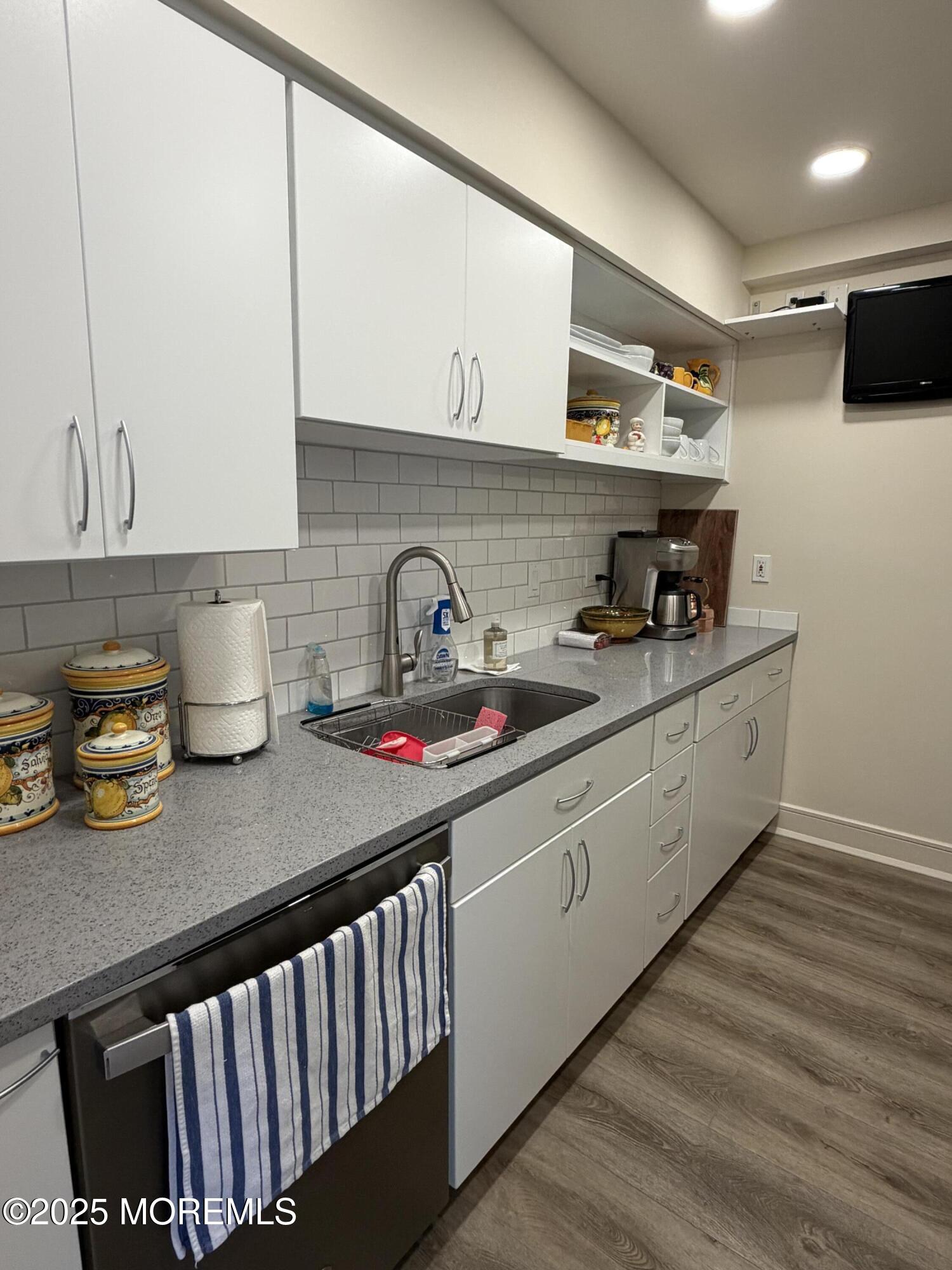 23 Locust Way Spring Lake Heights, NJ 07762 - Photo 7 of 57 a kitchen with lots of counter space and a sink