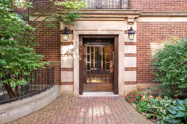a view of front door of house and an outdoor space