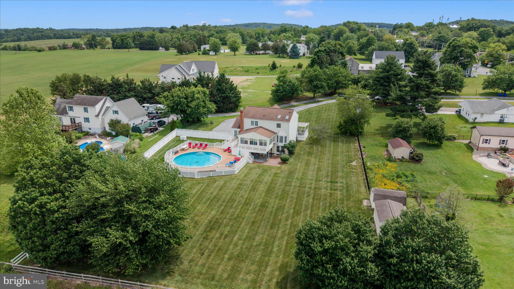 9534 Liberty Road Frederick, MD 21701 - Photo 4 of 70 an aerial view of house with yard swimming pool and outdoor seating