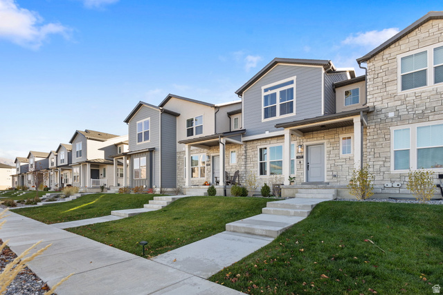 3473 Hardman Way Lehi, UT 84048 - Photo 2 of 22 View of front of house featuring a residential view, stone siding, and a front yard