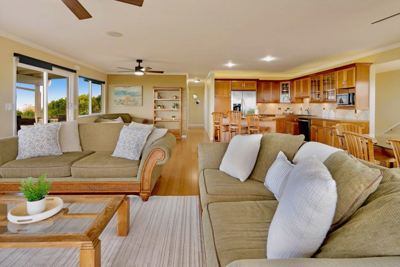 1115 Pookela Road Makawao, HI 96768 - Photo 12 of 37 a living room with furniture and wooden floor