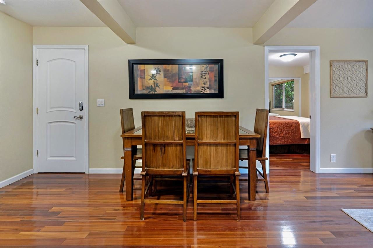 1115 Pookela Road Makawao, HI 96768 - Photo 30 of 37 a dining room with furniture and wooden floor