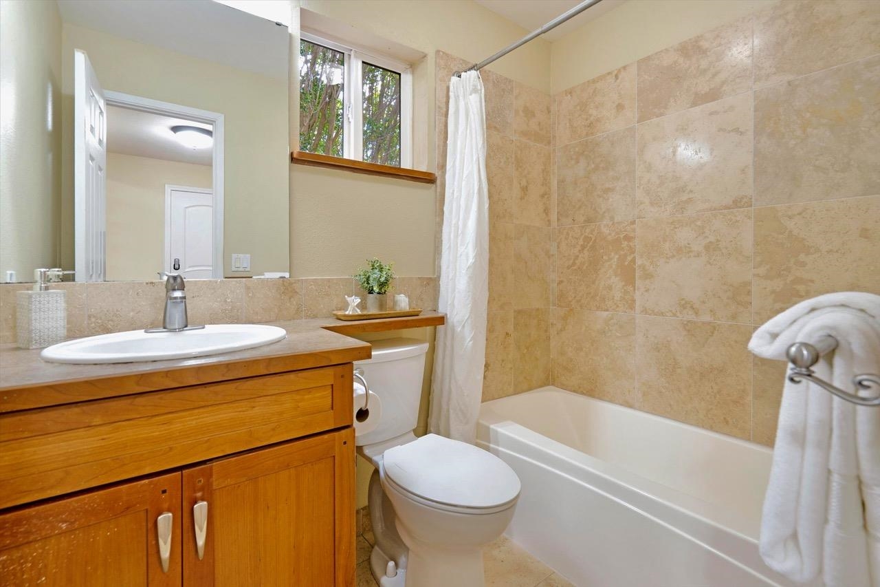 1115 Pookela Road Makawao, HI 96768 - Photo 32 of 37 a bathroom with a sink toilet and shower