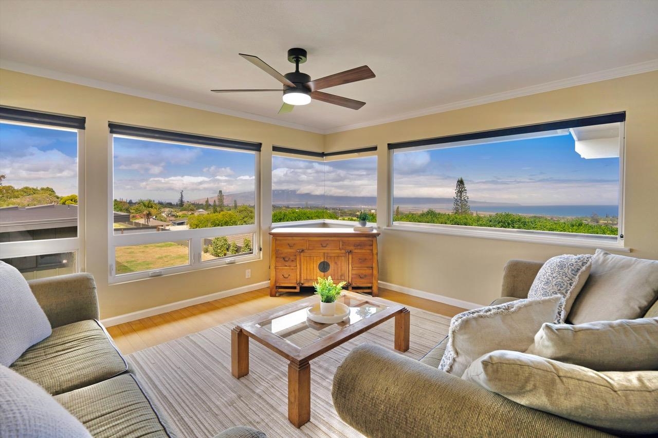1115 Pookela Road Makawao, HI 96768 - Photo 4 of 37 a living room with furniture and a large window