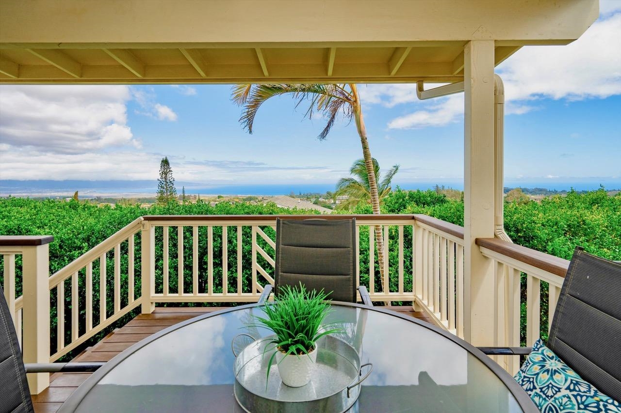 1115 Pookela Road Makawao, HI 96768 - Photo 9 of 37 a balcony with wooden floor