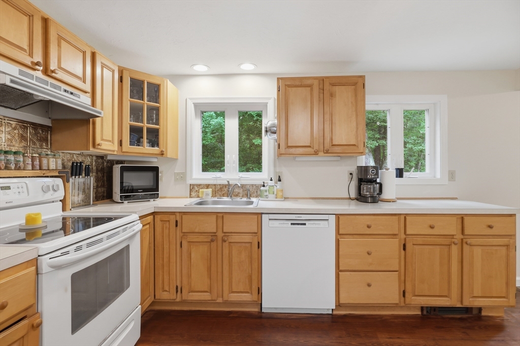 60 Petersham Road Phillipston, MA 01331 - Photo 11 of 33 a kitchen with a sink stove and cabinets