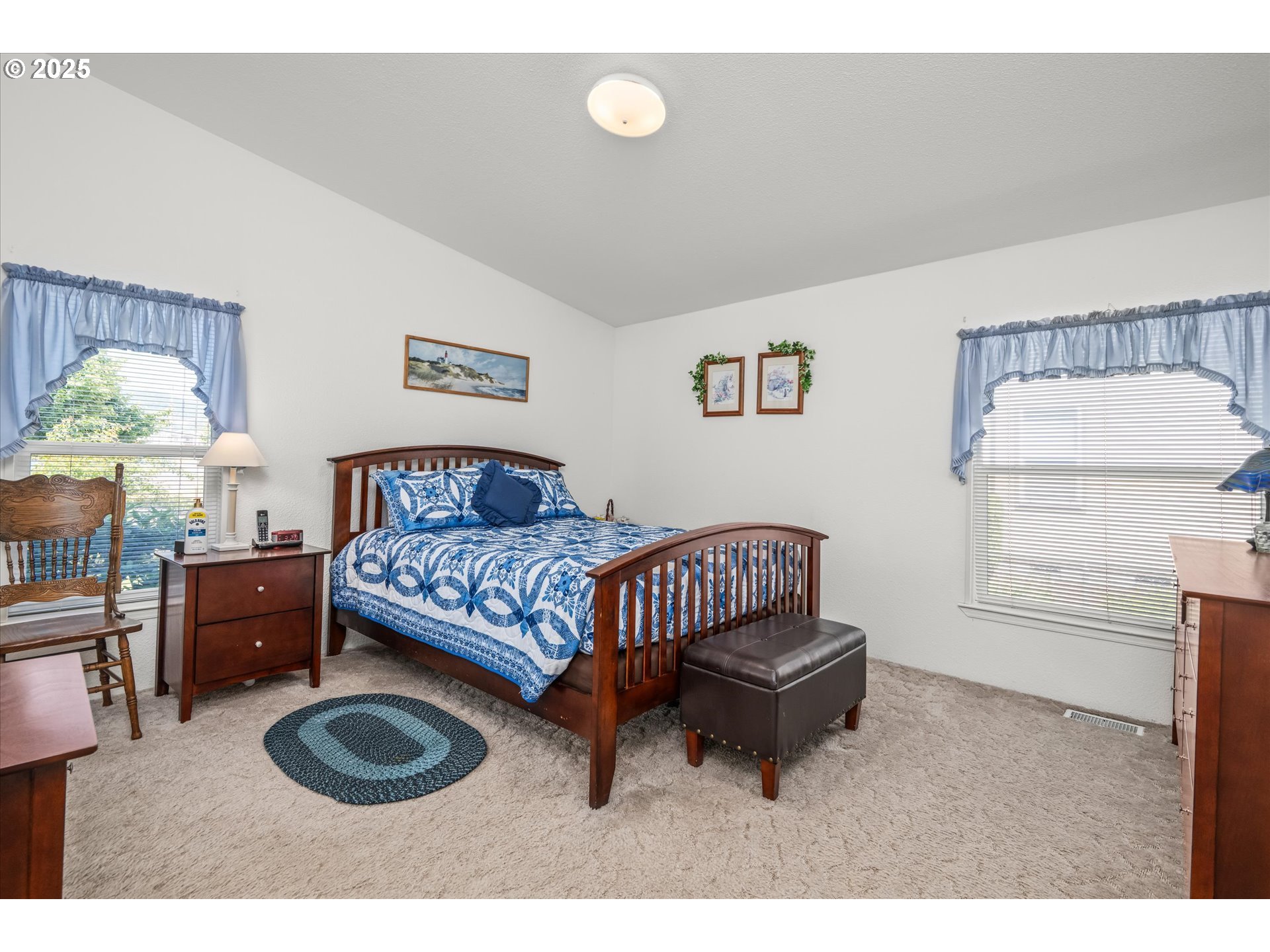 2668 Maia Loop Springfield, OR 97477 - Photo 17 of 28 a living room with furniture and a rug