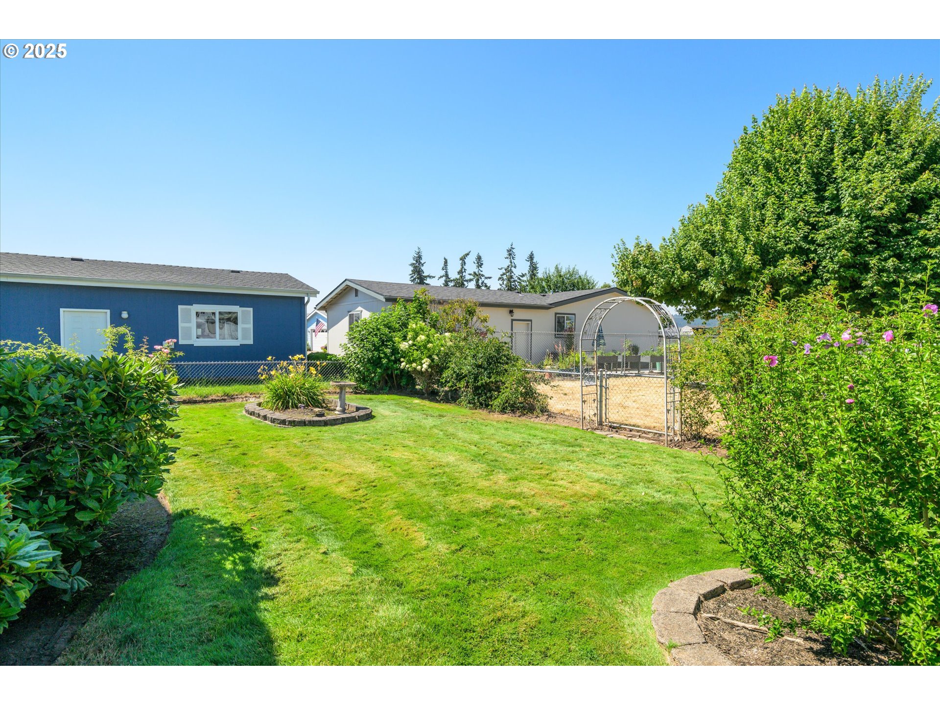 2668 Maia Loop Springfield, OR 97477 - Photo 28 of 28 a house view with a garden space