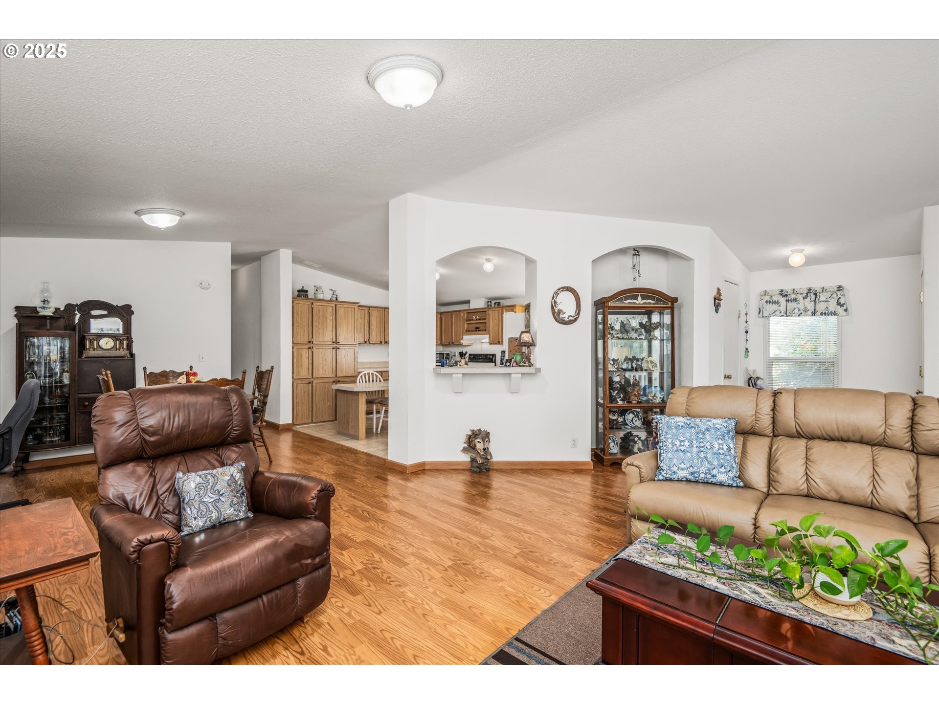 2668 Maia Loop Springfield, OR 97477 - Photo 10 of 28 a living room with furniture and a large window