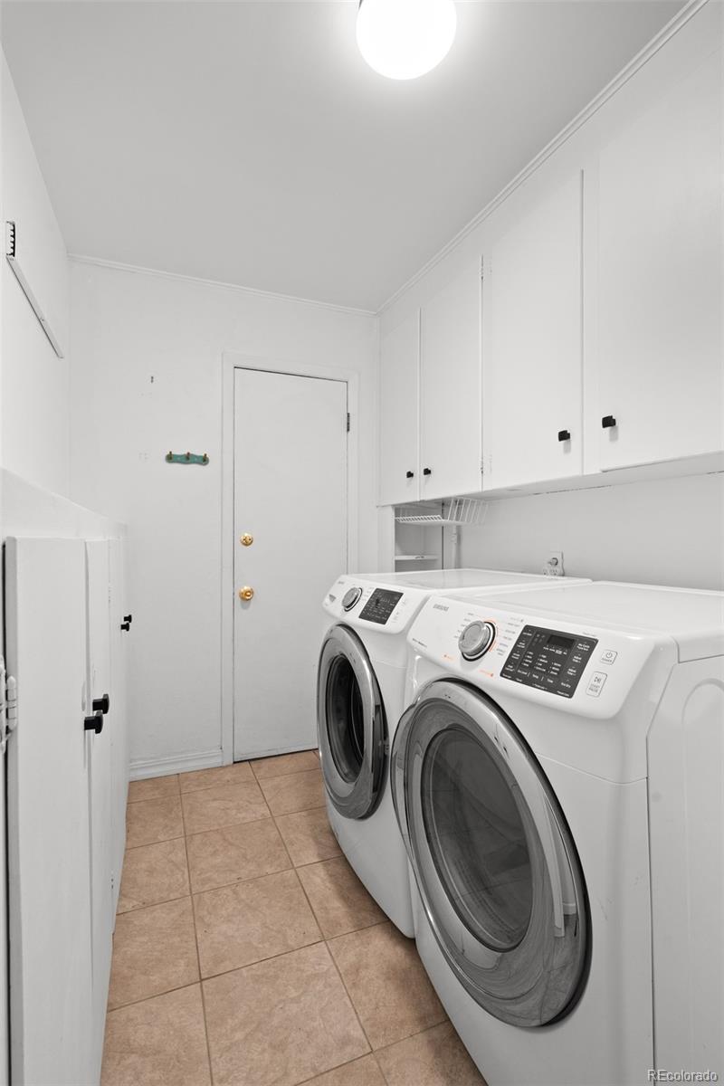 6755 West 45th Avenue Wheat Ridge, CO 80033 - Photo 17 of 27 a utility room with dryer and washer