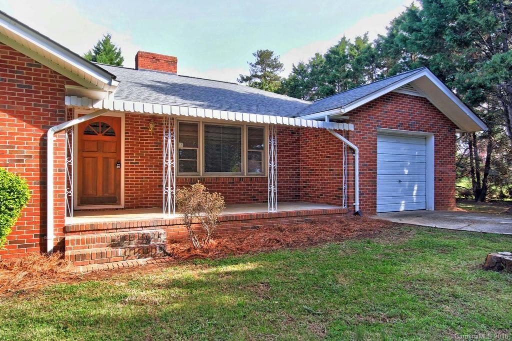 150 Rockwell Road Rockwell, NC 28138 - Photo 2 of 34 front view of a house with a yard