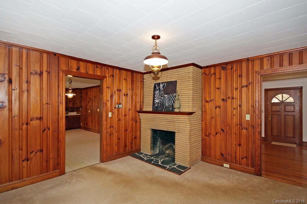 150 Rockwell Road Rockwell, NC 28138 - Photo 13 of 34 wooden floor in an empty room with a fireplace