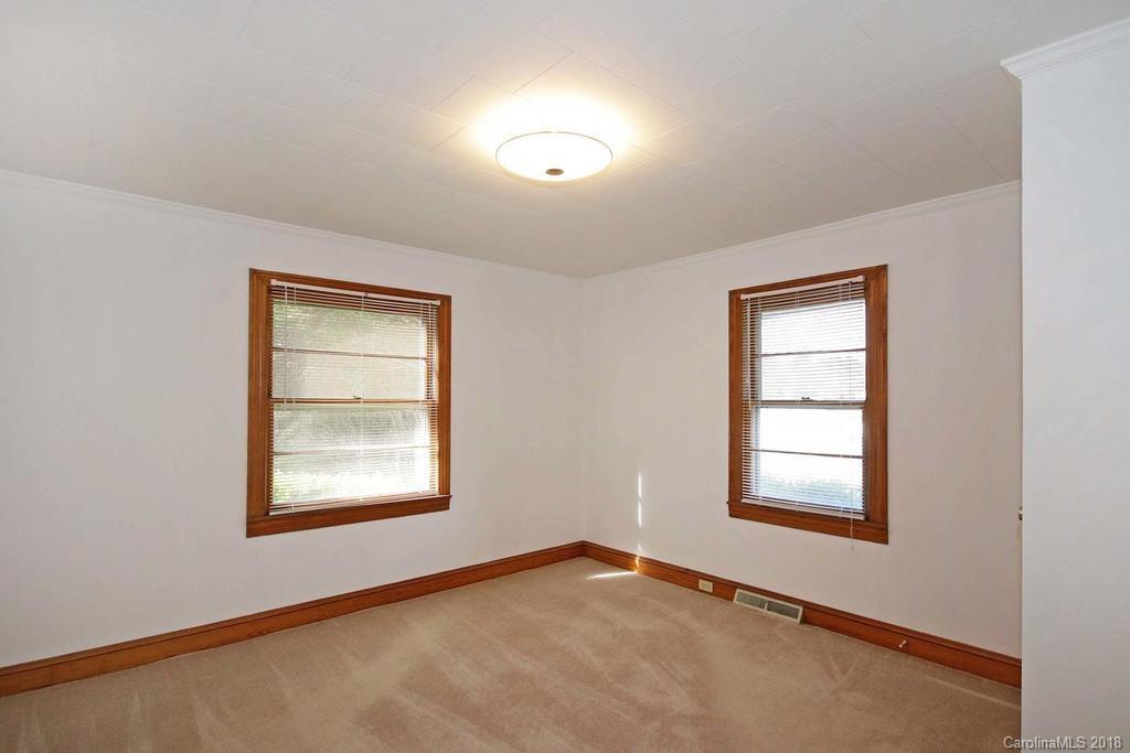 150 Rockwell Road Rockwell, NC 28138 - Photo 21 of 34 an empty room with windows