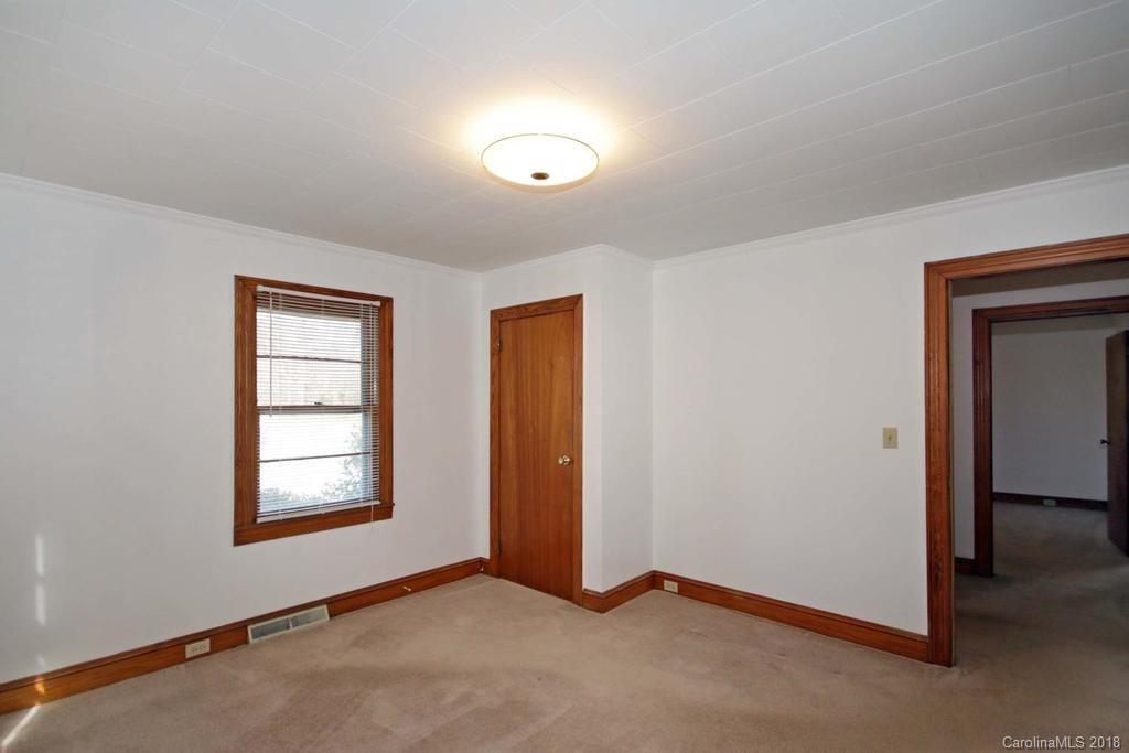 150 Rockwell Road Rockwell, NC 28138 - Photo 23 of 34 an empty room with windows and closet