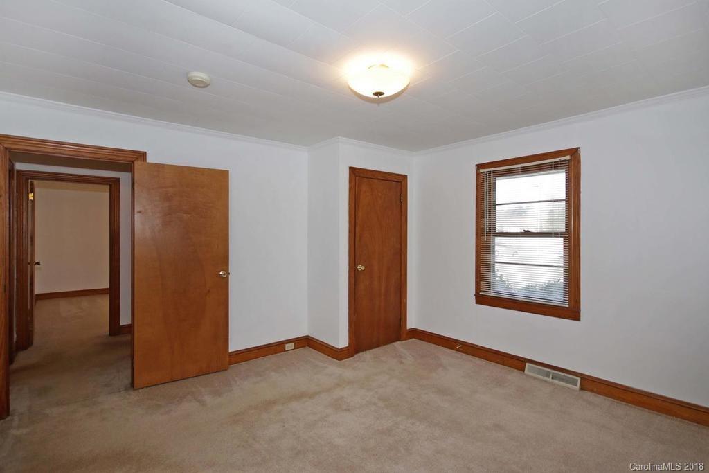 150 Rockwell Road Rockwell, NC 28138 - Photo 27 of 34 an empty room with windows and closet