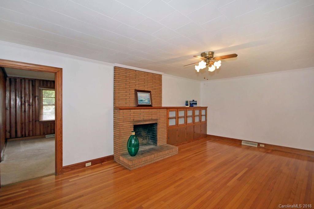 150 Rockwell Road Rockwell, NC 28138 - Photo 6 of 34 a living room with furniture and a fireplace