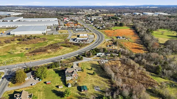 a view of a lake with a yard