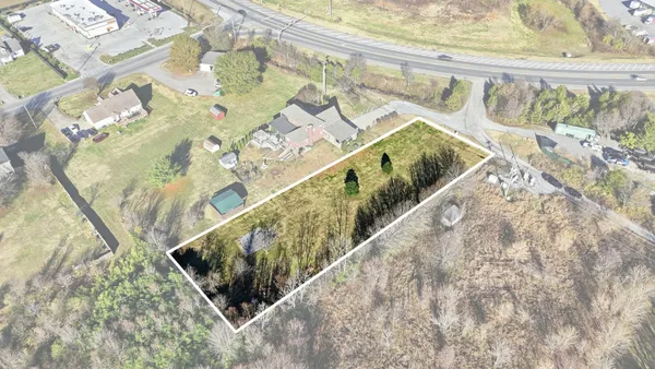 a view of swimming pool with outdoor seating