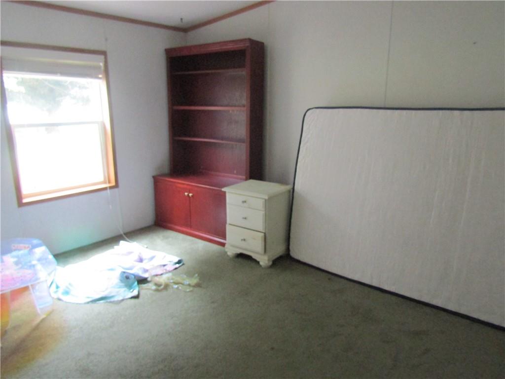 521 Williams Street Confluence, PA 15424 - Photo 12 of 38 a room with a bed and a window