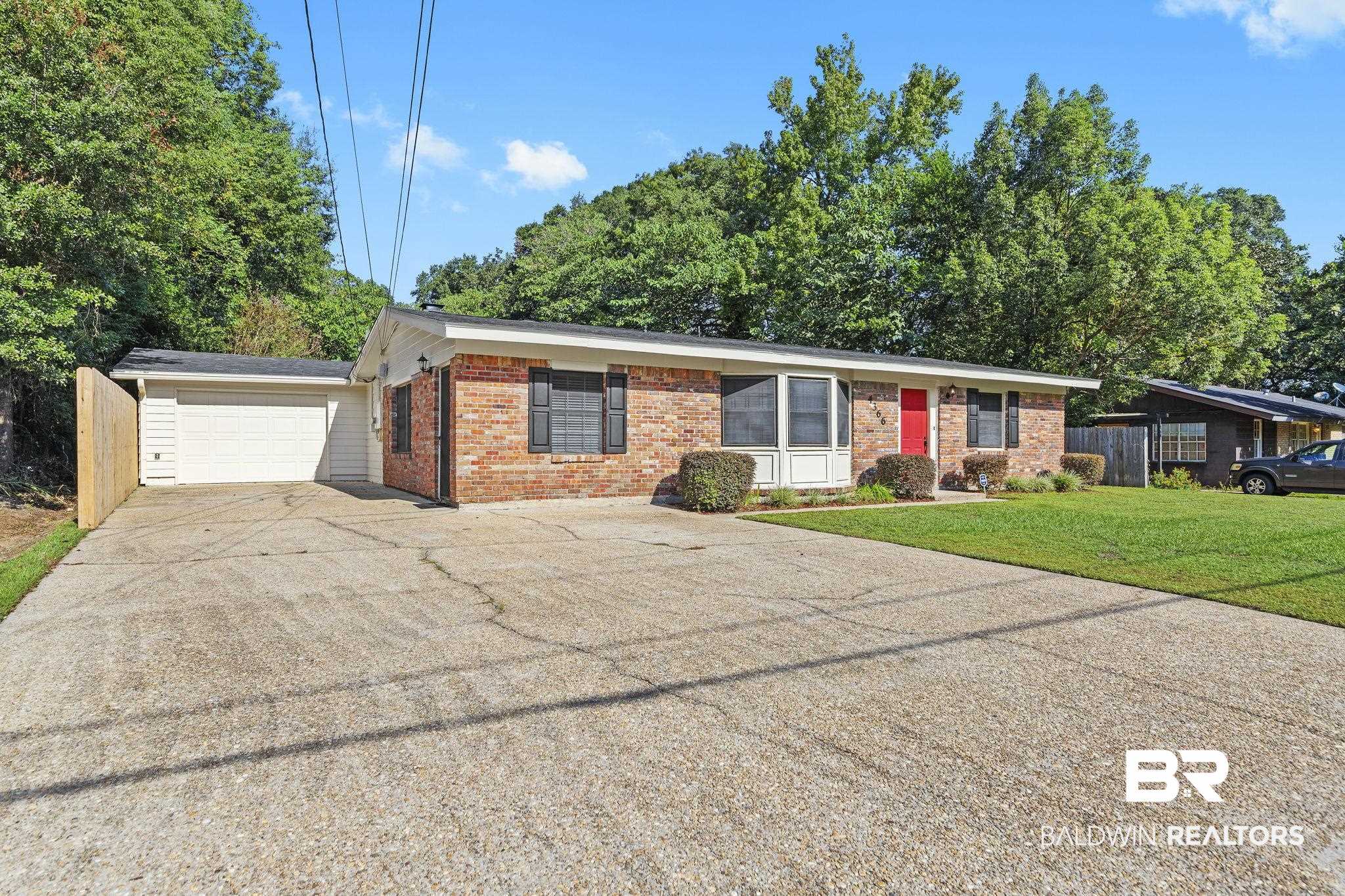 4366 Barden Avenue Mobile, AL 36619 - Photo 3 of 40 Single story home featuring a garage and a front lawn