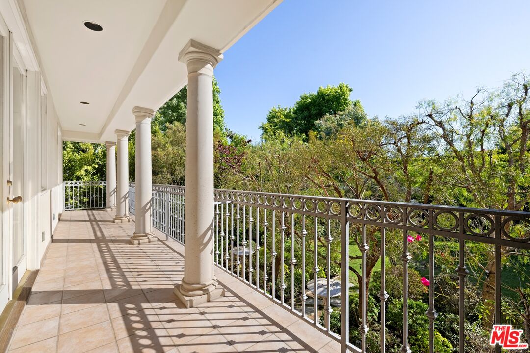 625 Foothill Road Beverly Hills, CA 90210 - Photo 14 of 22 a view of balcony with furniture