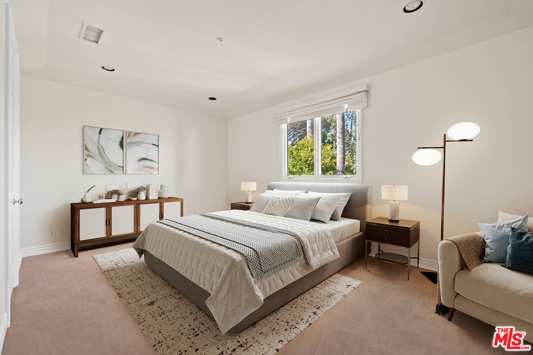 625 Foothill Road Beverly Hills, CA 90210 - Photo 16 of 22 a bedroom with a bed couch and window