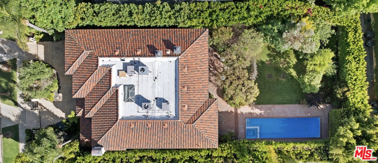 625 Foothill Road Beverly Hills, CA 90210 - Photo 19 of 22 an aerial view of a house with a yard and potted plants