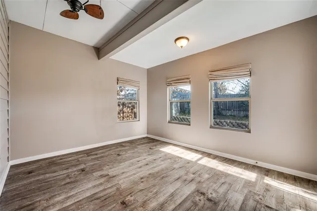 a view of an empty room and window