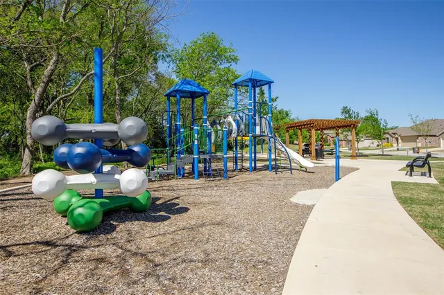 a view of a chairs and tables in the patio