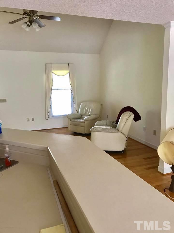 144 Ruff Davis Road Roxboro, NC 27574 - Photo 15 of 16 a bathroom with a sink and a window