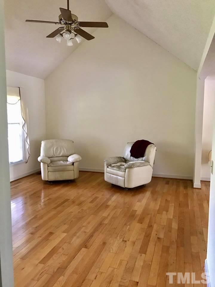 144 Ruff Davis Road Roxboro, NC 27574 - Photo 6 of 16 a living room with furniture and a wooden floor