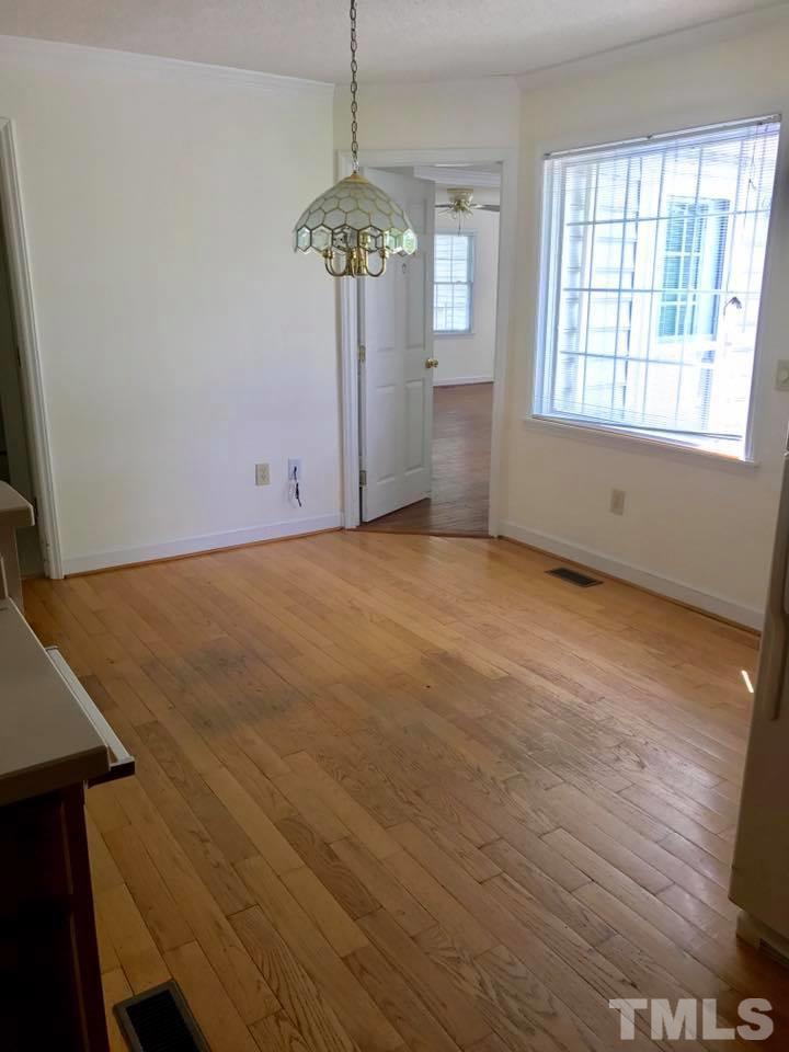 144 Ruff Davis Road Roxboro, NC 27574 - Photo 8 of 16 an empty room with a window