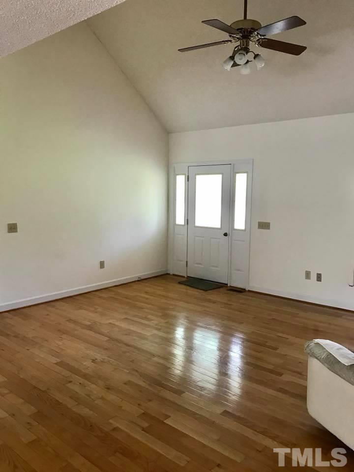 144 Ruff Davis Road Roxboro, NC 27574 - Photo 9 of 16 a view of an empty room and window