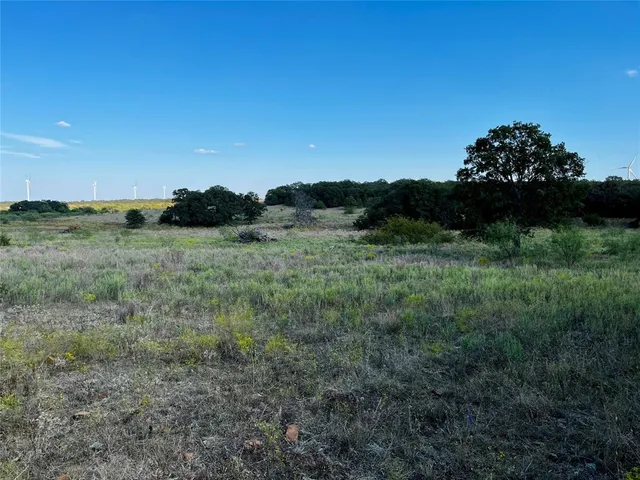 a view of a lake with a city