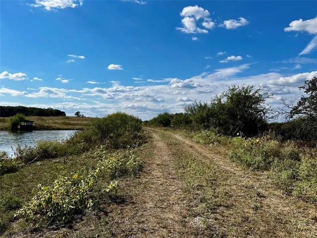 a view of a lake with a mountain in the background