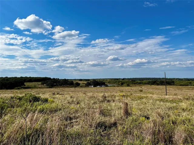 a view of a lake with a house