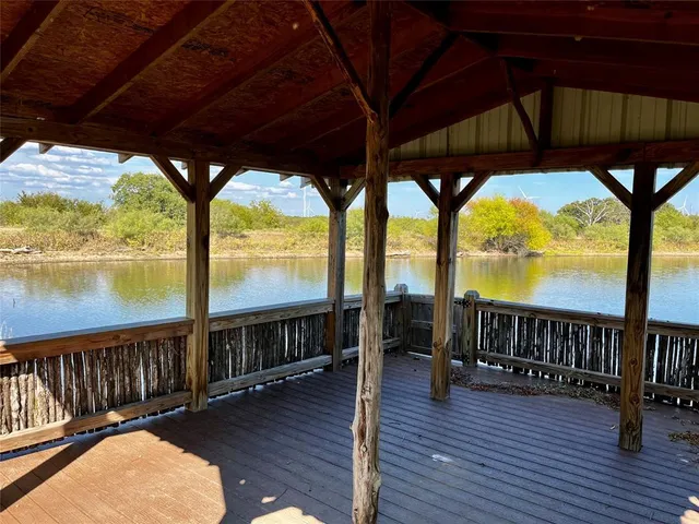 a view of swimming pool with outdoor seating