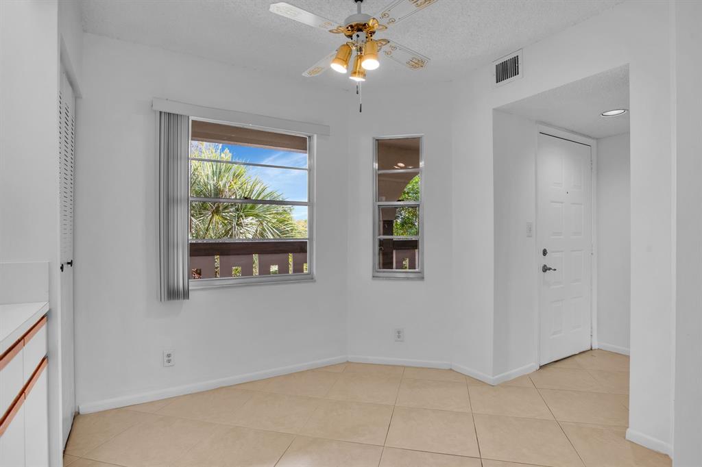1601 Abaco Drive, Unit D4 Coconut Creek, FL 33066 - Photo 3 of 30 a view of empty room with window