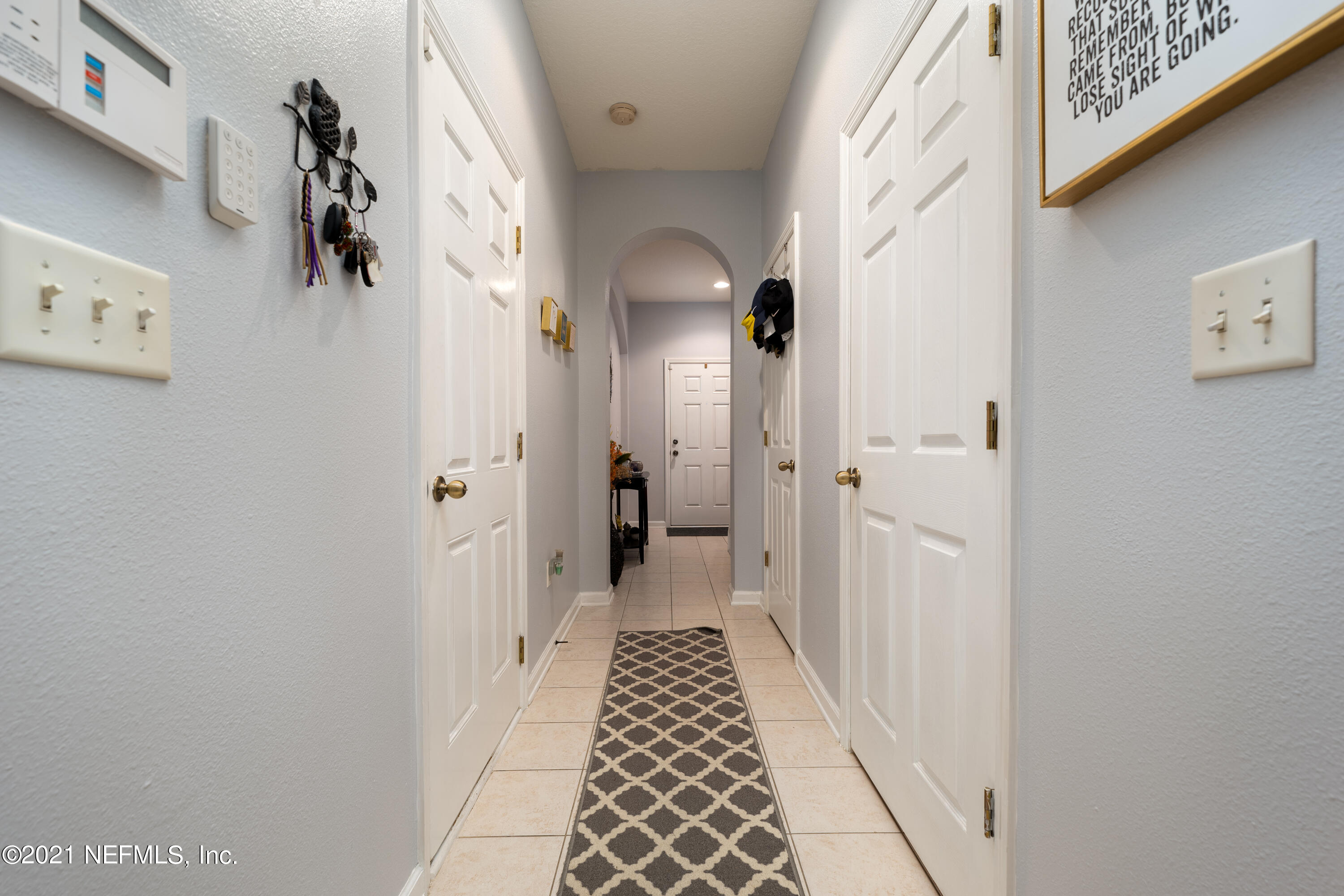 655 Crystal Way Orange Park, FL 32065 - Photo 17 of 37 Powder Room and Garage Entrance