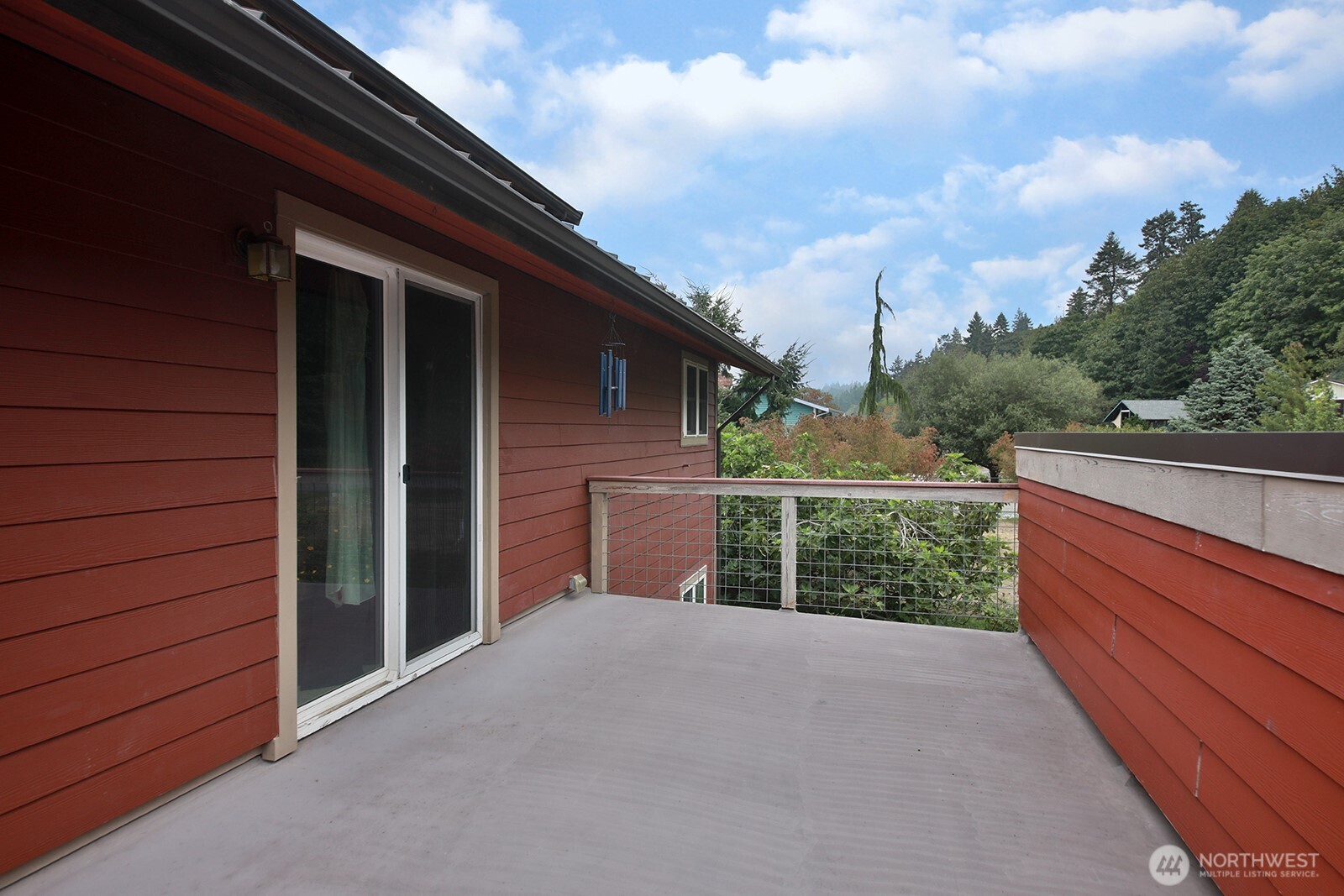 8122 Autumn Lane Clinton, WA 98236 - Photo 13 of 35 a balcony with a yard