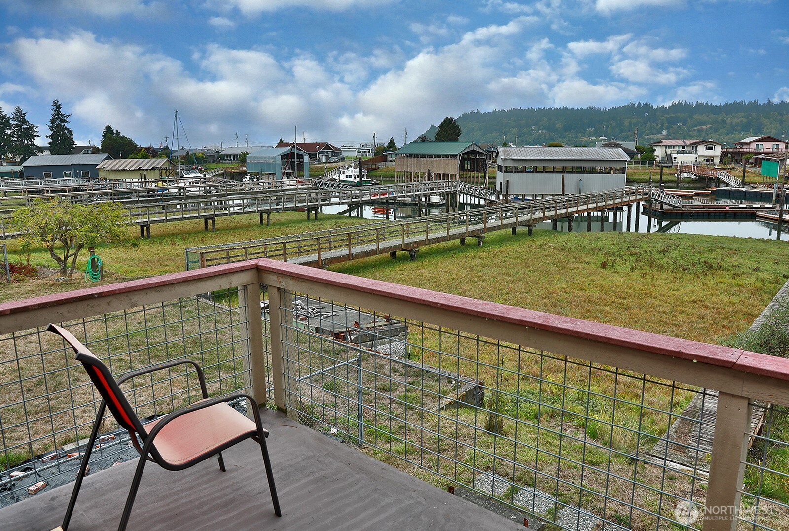 8122 Autumn Lane Clinton, WA 98236 - Photo 15 of 35 a view of a chairs and table in the balcony