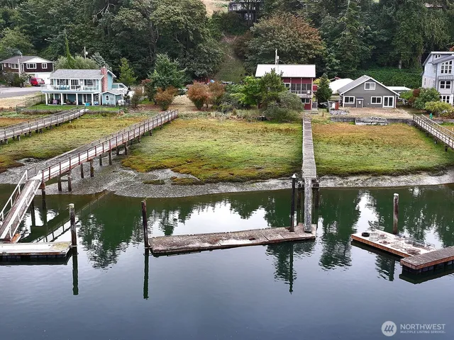 a view of a lake with a house