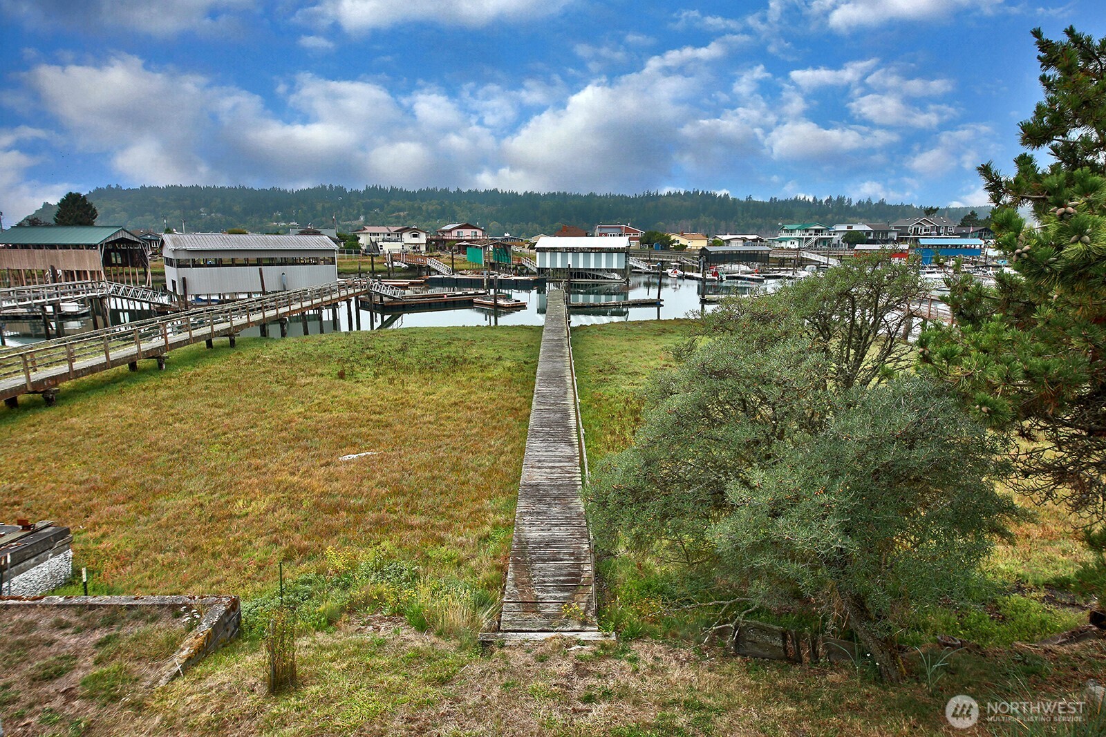8122 Autumn Lane Clinton, WA 98236 - Photo 22 of 35 a view of a lake with houses