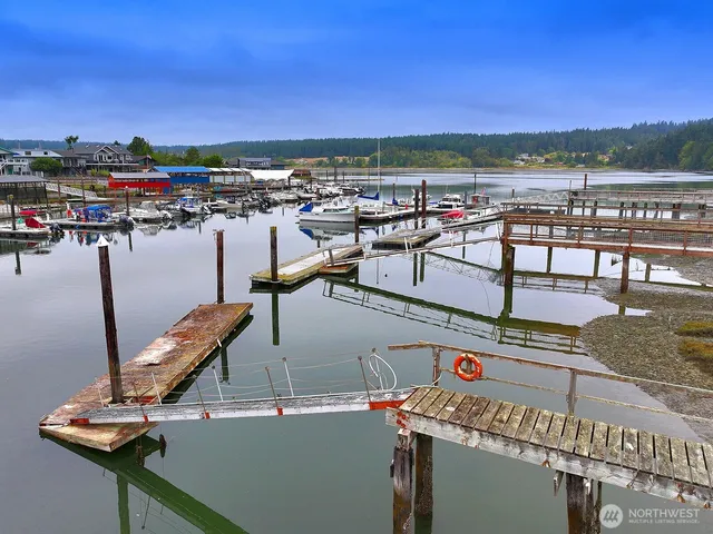 a view of a balcony with chairs