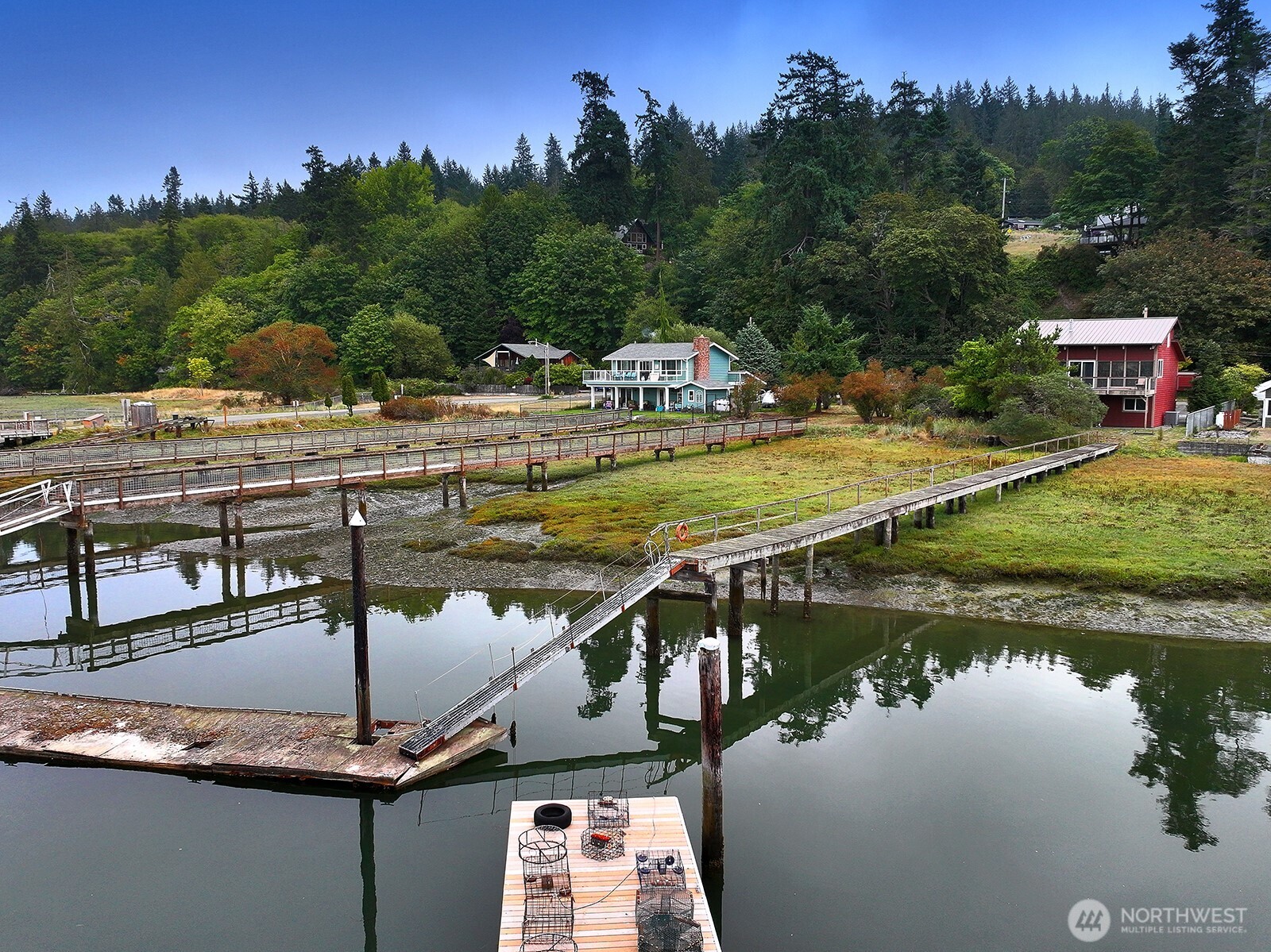 8122 Autumn Lane Clinton, WA 98236 - Photo 26 of 35 a view of a lake with houses