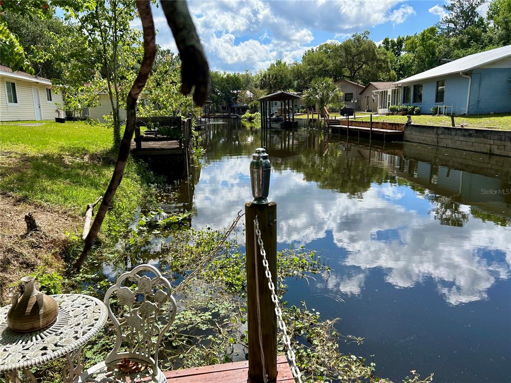 25646 Bass Road Astor, FL 32102 - Photo 6 of 48 a front view of a house with a yard