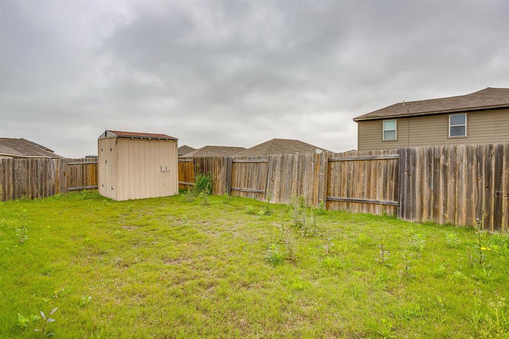 136 Kennedy Drive Venus, TX 76084 - Photo 23 of 27 a backyard of a house