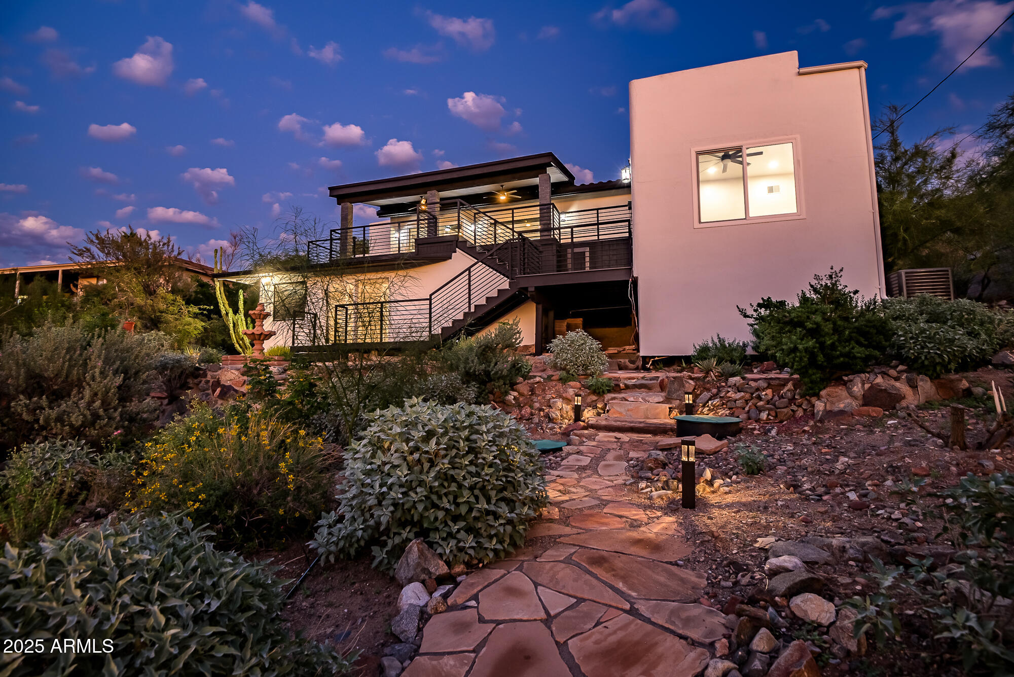 13428 North 16th Place Phoenix, AZ 85022 - Photo 22 of 29 a front view of a house with garden