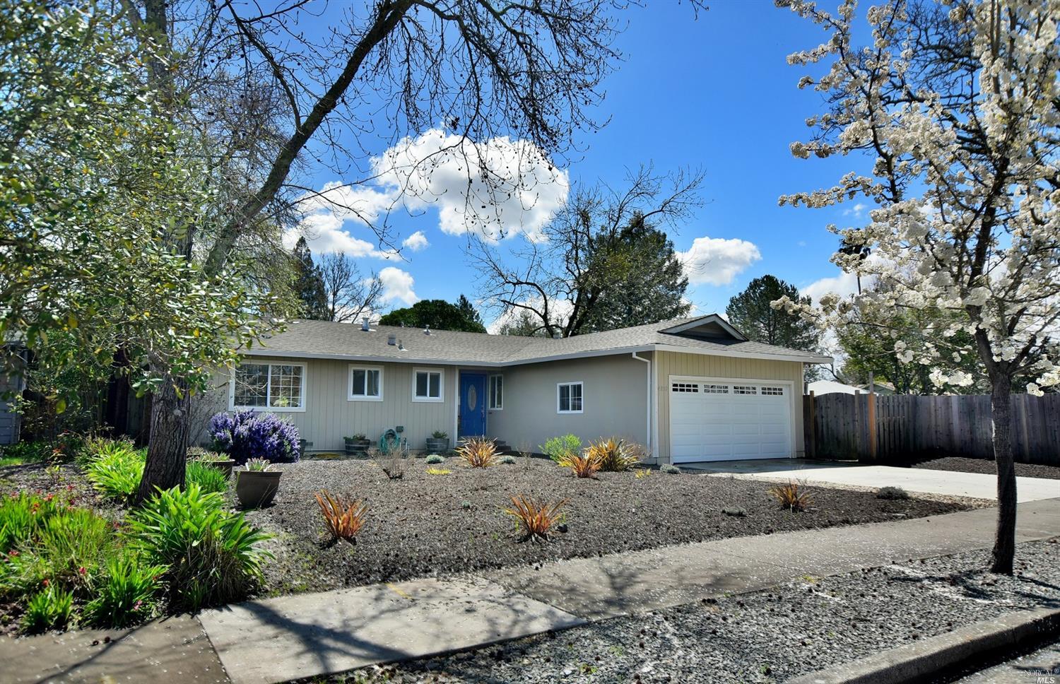 4852 Canyon Drive Santa Rosa, CA 95409 - Photo 1 of 1 a front view of a house with a yard