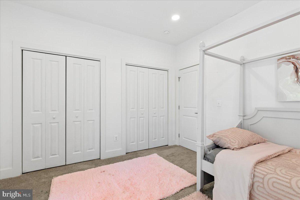 3249 Arundel On The Bay Road Annapolis, MD 21403 - Photo 21 of 88 a bedroom with a bed and a shower